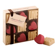 VALENTINES CHOCOLATES with Love Sculptures and Pink Hearts