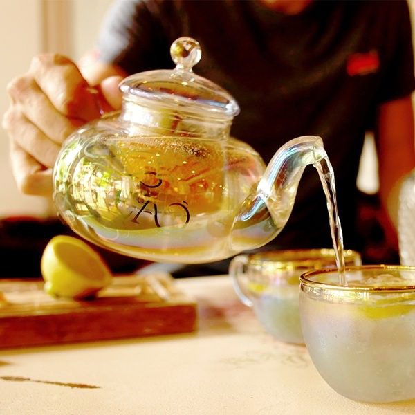 Glass-Teapot-and-Teacup-with-Gold-Details