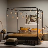 Product photograph of Woood Kingsize Black Metal Four Poster Bed from Cuckooland