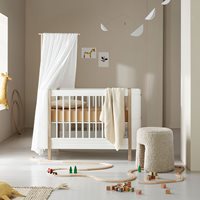 Product photograph of Oliver Furniture Wood Mini 4 In 1 Cot Bed In White Oak from Cuckooland