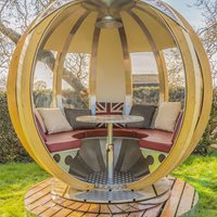 Product photograph of Ornate Garden Rotating Lounger Garden Pod - Mulled Wine from Cuckooland