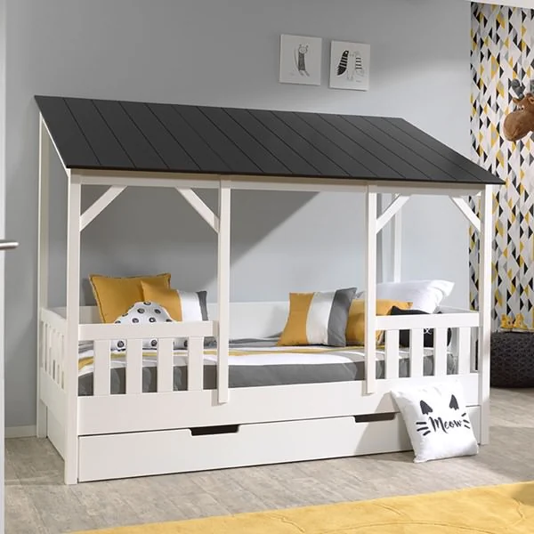 White housebed with black roof