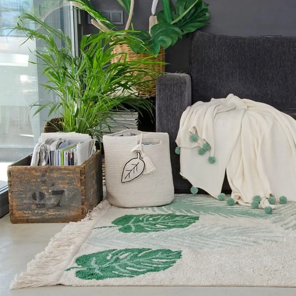 Living room with leaf print rug by lorena canals