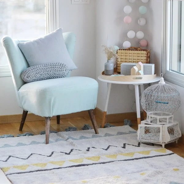 Living room with aztec rug in vintage blue