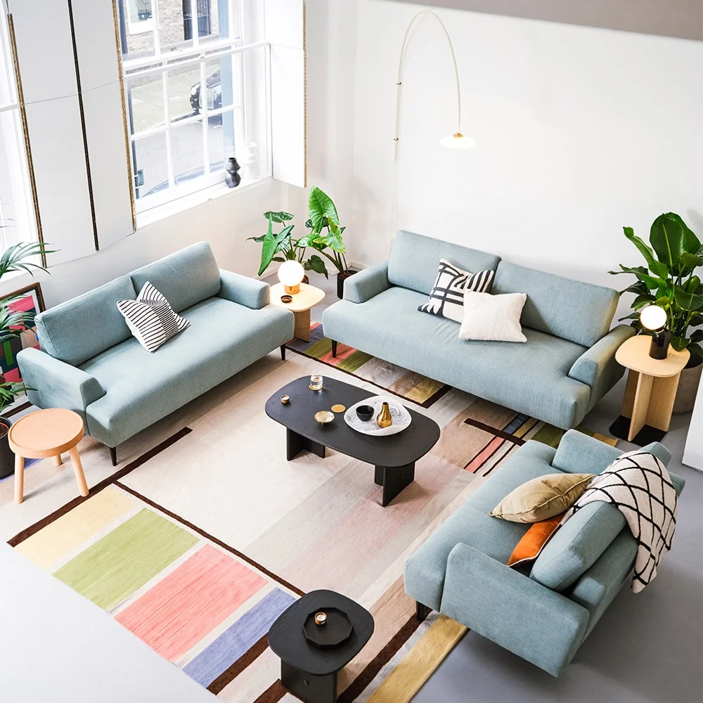 Model 05 turquoise blue linen sofas from swyft
