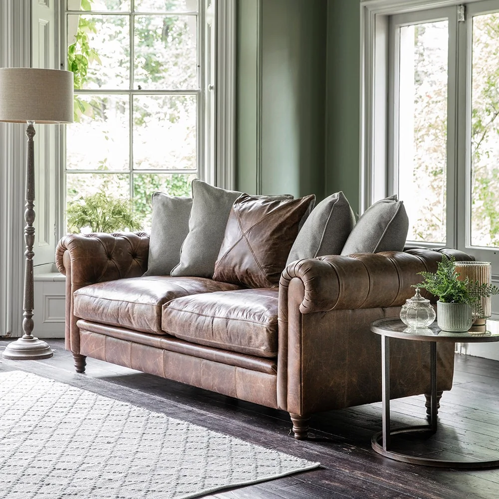 Vintage brown leather chesterfield sofa in box with fabric and leather cushions