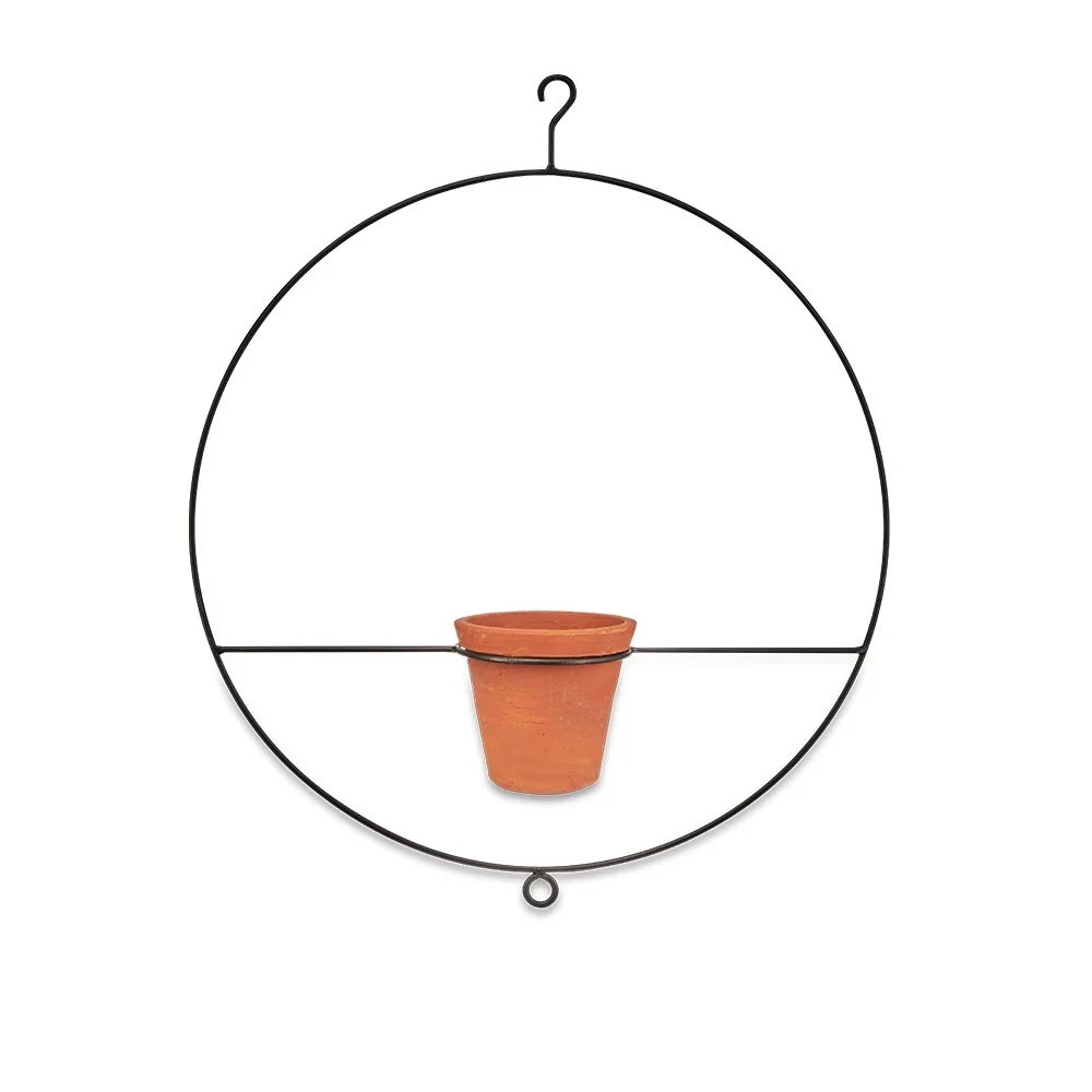 Iron indoor planter with terracotta pot