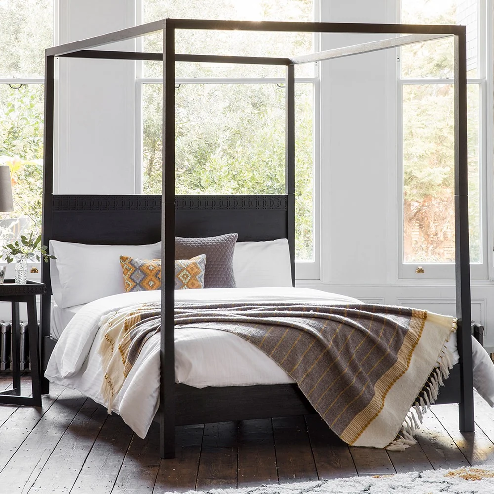 Boho wooden four poster bed