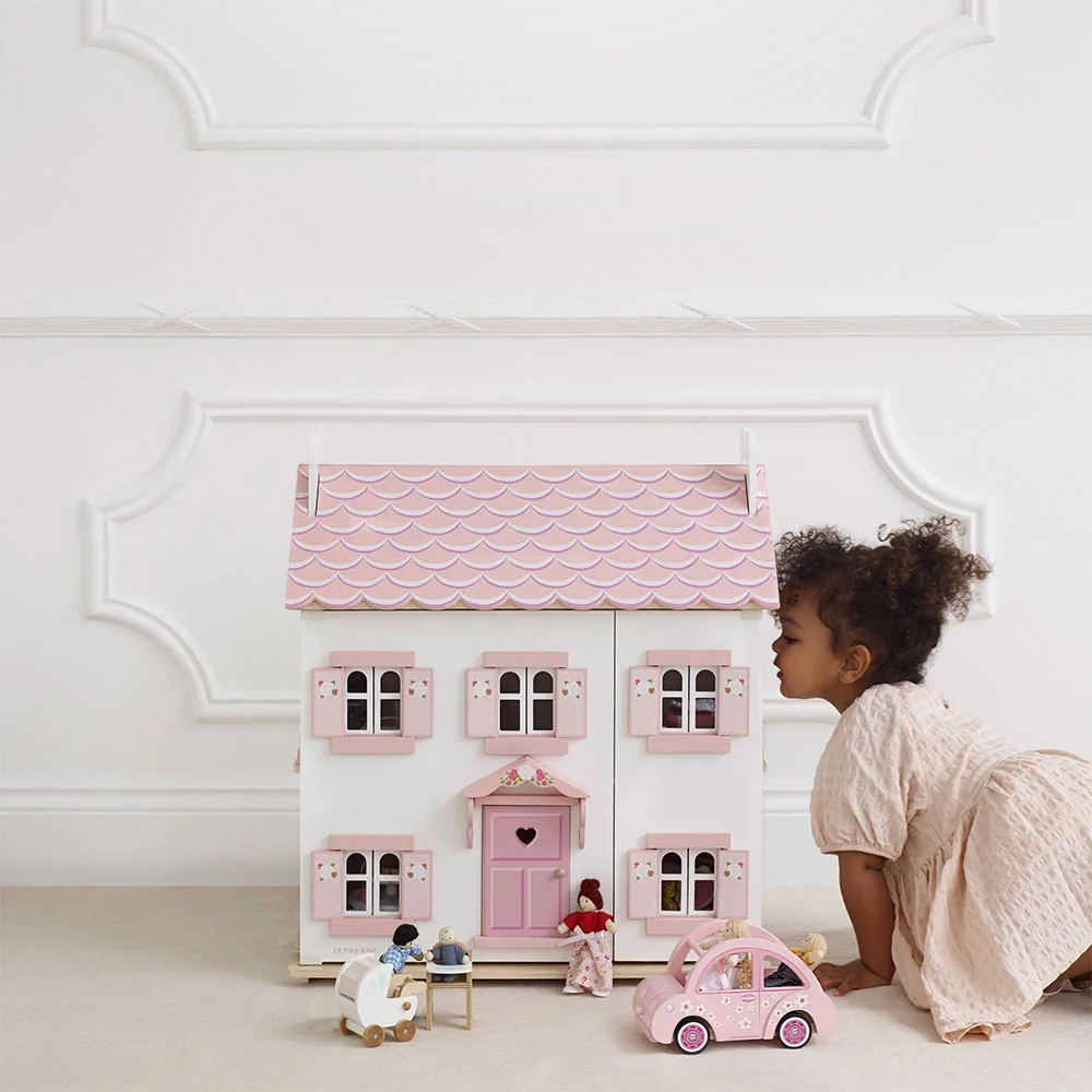 Wooden dolls house by le toy van