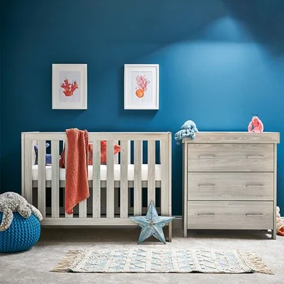 Adjustable cot bed and chest drawer bedroom furniture set