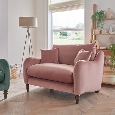 Cumulo love seat in dusty pink velvet with walnut feet