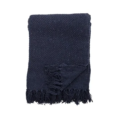 Dark blue knitted cotton throw
