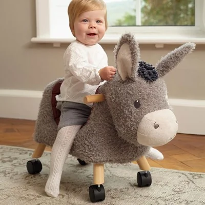 Donkey ride on plush toy with wooden frame and wheels