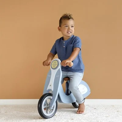 Matte blue balance bike with soft saddle and handgrips