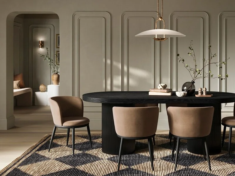 Curve velvet dining chair with black legs and curved backrest