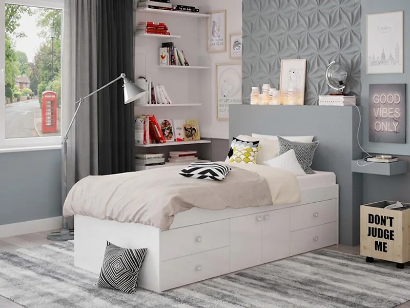 White single cabin bed with four drawers and central cupboard