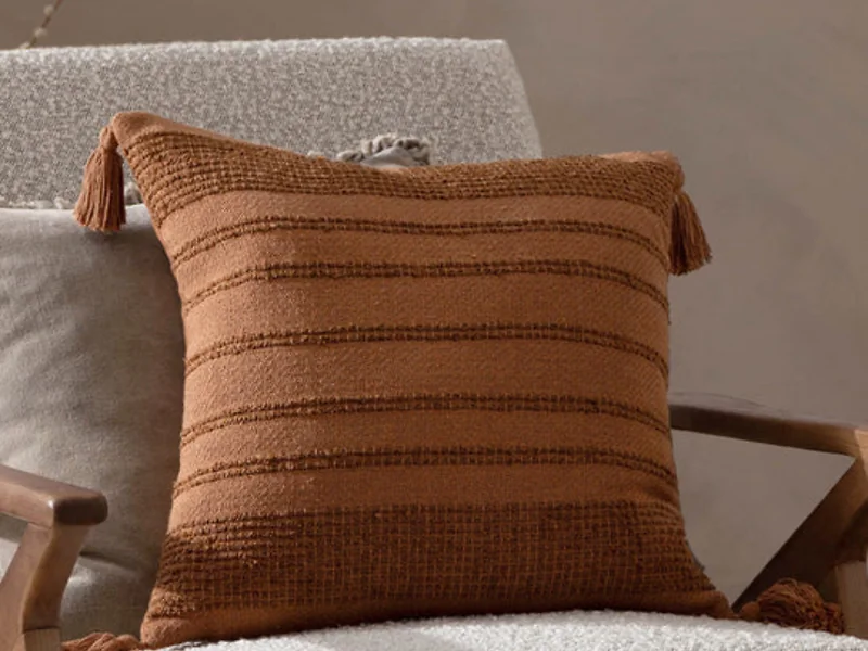 Cotton blend woven cushion with tassels