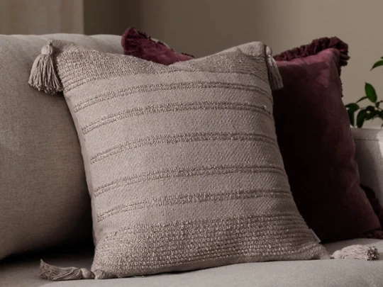 Bohemian style cushion with tassel corners