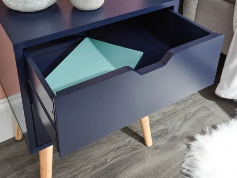 Nyborg 2 drawer bedside table with tapered pine legs and Scandi-inspired design.