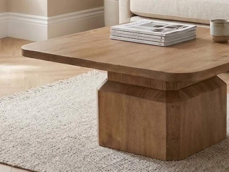 Kyoto Remy solid mango wood coffee table with bold angular shapes and clean lines.