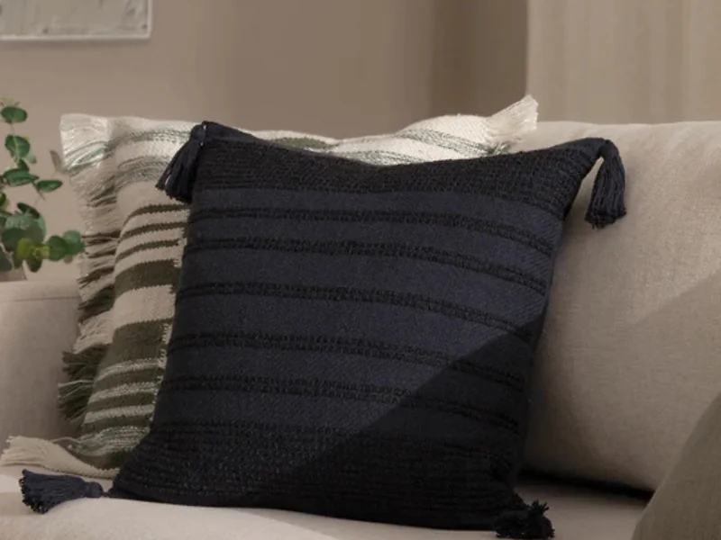 Cotton blend woven cushion with tassels