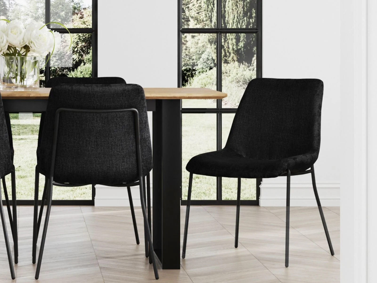 Carlo black textured velvet dining chair with curved metal frame
