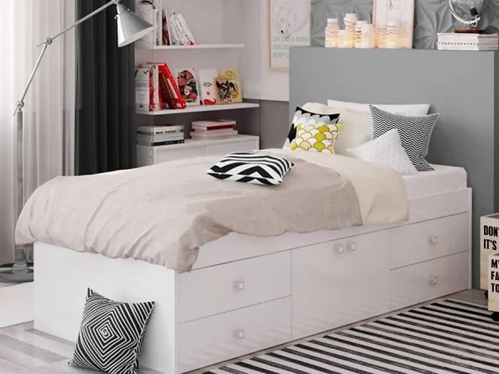 White single cabin bed with four drawers and central cupboard